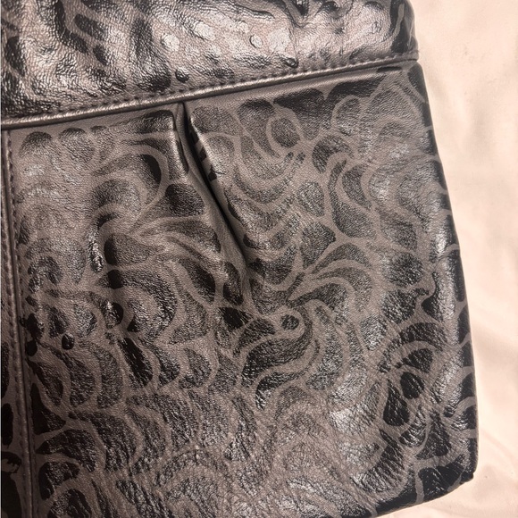 Hand painted one of a long grey and black clutch purse.